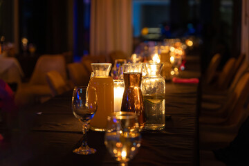 Table in a hotel restaurant filled with drinks during a corporate event
