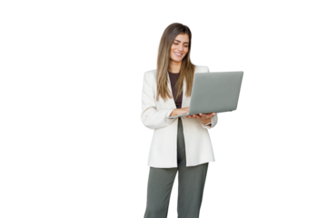 Businesswoman standing, holding laptop, and smiling, conveying professionalism, success, and connection to technology