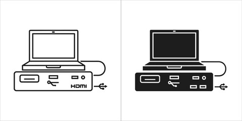Laptop computer connected to a docking station, outline and black silhouette