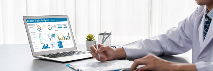 Computer software for website traffic analytics data on computer screen. Concept of SEO search...