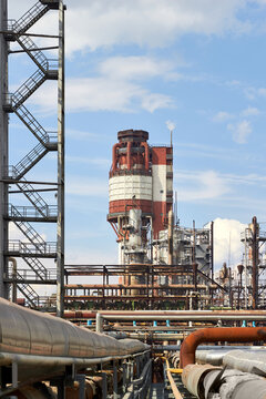 Tower granulator chimney cooling tower granular fertilizer and petrochemical caprolactam cyclohexanone organic production refinery column tower and reactor. Petrochemical equipment of chemical plant.