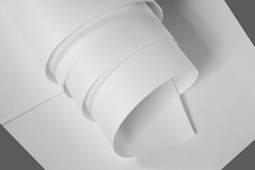 Long sheets of paper from a roll in black and white. A delicate pastel image. Can be used as a background.