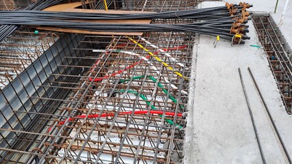 rebar and electrical conduit installation in concrete slab construction