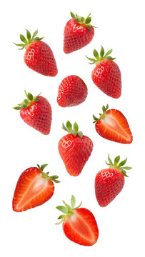 Fresh strawberries falling isolated on transparent background