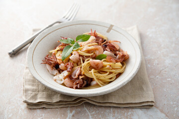 Spaghetti with seafood and basil