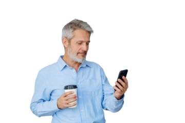 Mature man enjoying a coffee break, checking messages and staying connected with technology. Background is transparent