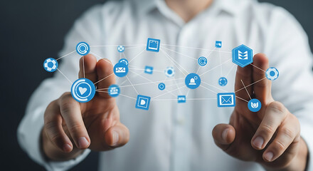 A person's hands interacting with a digital network of interconnected icons representing various services and data points.