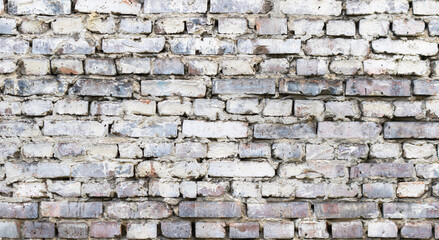 a brick wall painted white