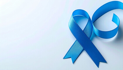 Blue awareness ribbon on white background, diabetes awareness, medical and support concept.