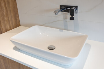 Modern white tiled simple minimal bathroom