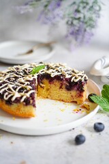 Homemade Blueberry upside down cake with white chocolate drizzle