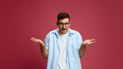 Confused man shrugging shoulders with questioning look expressing uncertainty. Concept of indecision, UX confusion, finance reaction, and meme humor for social media engagement.