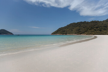 Beautiful beach with white sand and turquoise water waves are running