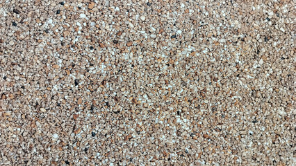 floor tiles. natural small stone gravel texture background. Rough pebble surface with brown and white tones, nature pattern background. luxury background.