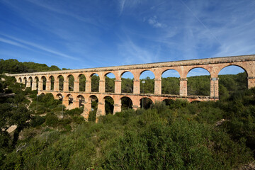 Obraz premium Roman Aqueduct, Les Ferreres or Devil's Bridge, Tarragona, Catalonia, Spain
