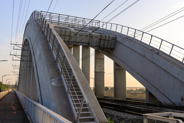Bridge with a metal railing and a staircase