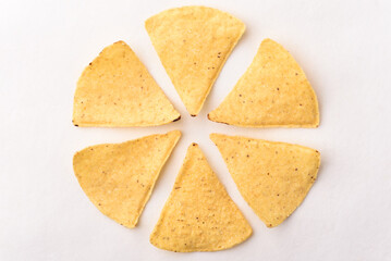 Tortilla chips made from baked corn for Mexican food snack on white background