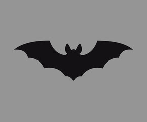 Illustration of a classic black flying bat silhouette figure isolated on a plain background for graphic design or digital artwork