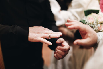 bride and groom holding hands