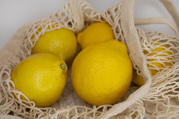 White Minimal Background with Yellow Lemons – Clean Flat Lay Mockup for Design and Branding