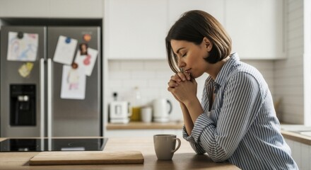 A religious woman praying in her kitchen in the morning. A mother having a quiet moment for faith and contemplation. Expressing gratitude or seeking hope