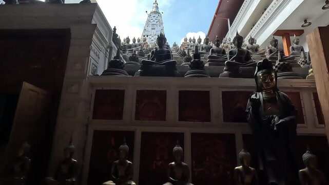 Rows of Buddha Statues at Gangarama Temple &ndash; Spiritual and Cultural Heritage
