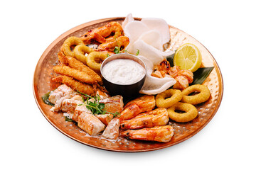 Delicious seafood platter with shrimp, onion rings, and dipping sauce