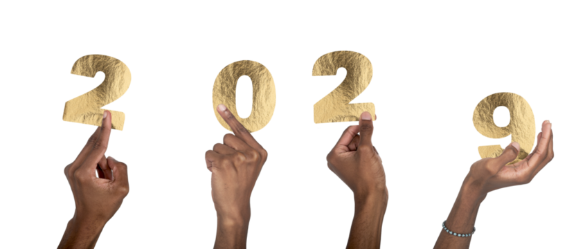 2029 new year celebration concept. African American man with dark skin hand raised holding golden