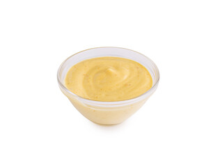 Creamy yellow sauce in a glass bowl with smooth texture