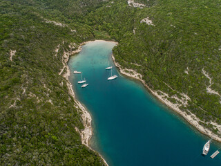 Aerial view marina cape Bonifacio south Corsica France citadel on rocky promontory on wild white limestone cliffs