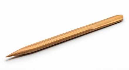 Obraz premium Single wooden clay modeling tool on white background