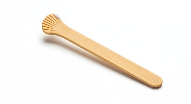Wooden back scratcher on white background