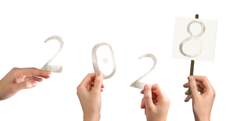 Hand holding silver metallic 2028 number in festive celebration. Shiny textured foil typography