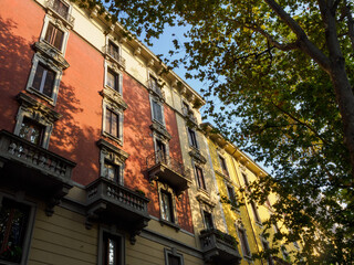 Historic residential buildings along via Ruggero di Lauria in Milan, Italy