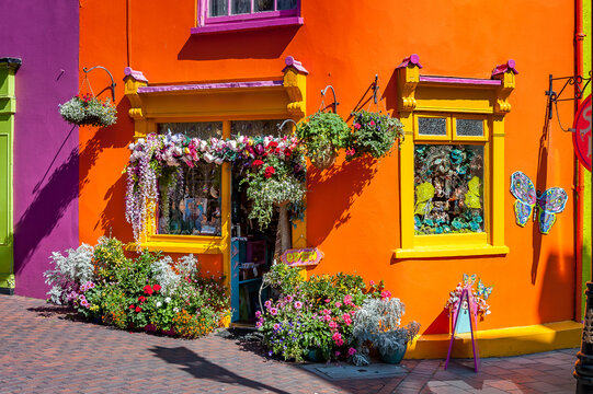 Quaint street lined with vibrant colorful buildings in the Old Town of Kinsale, County Cork, Ireland