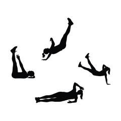 Silhouettes of women performing floor exercises