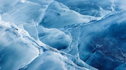 Obraz premium Fractured layers of thick blue ice creating a natural abstract pattern with cracks and varying transparent textures in a frozen landscape environment