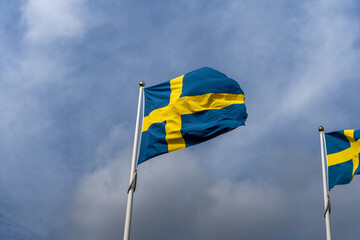 Swedish flag in with blue sky background