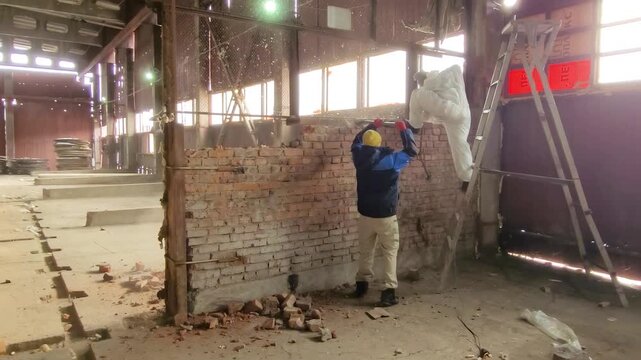 Demolition Work: Removing a Brick Wall with a Hammer