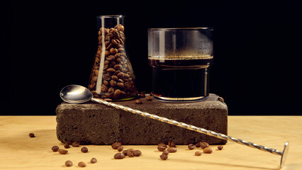 Black coffee and roasted beans in glass container with spoon on dark background minimal composition. Concept of beverage design, cafe branding, product advertising, and culinary craftsmanship.