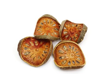 Dried Bael slices or Bengal quince white background