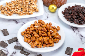 Homemade sweet bread filled with chocolate, dried fruits, walnuts, almonds, peanuts, candied nuts, raisins, and fruit, Christmas and Thanksgiving holiday bread. 