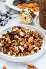 Homemade sweet bread filled with chocolate, dried fruits, walnuts, almonds, peanuts, candied nuts, raisins, and fruit, Christmas and Thanksgiving holiday bread. 