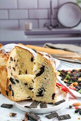 Homemade sweet bread filled with chocolate, dried fruits, walnuts, almonds, peanuts, candied nuts, raisins, and fruit, Christmas and Thanksgiving holiday bread. 
