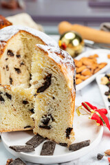 Homemade sweet bread filled with chocolate, dried fruits, walnuts, almonds, peanuts, candied nuts, raisins, and fruit, Christmas and Thanksgiving holiday bread. 