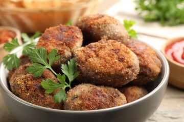 Tasty meat patties served on wooden table, closeup