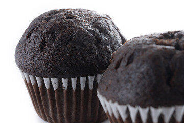 Chocolate muffins isolated on white background