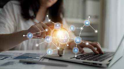 A business professional explores innovative ideas and technology at a workspace, highlighting the importance of creativity and connectivity in achieving success. Tessel