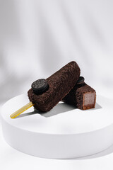 Decadent chocolate ice cream bars with cookies on display for dessert lovers