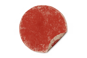 Red distressed round sticker peeling, revealing textured surface, grunge transparent template